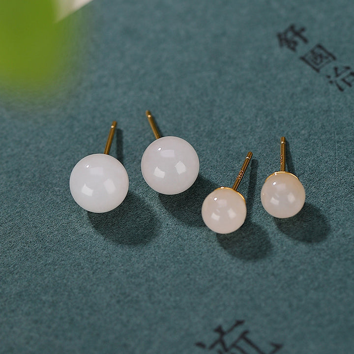 Orecchini a bottone rotondi in giada bianca con Buddha Stones in argento sterling 925