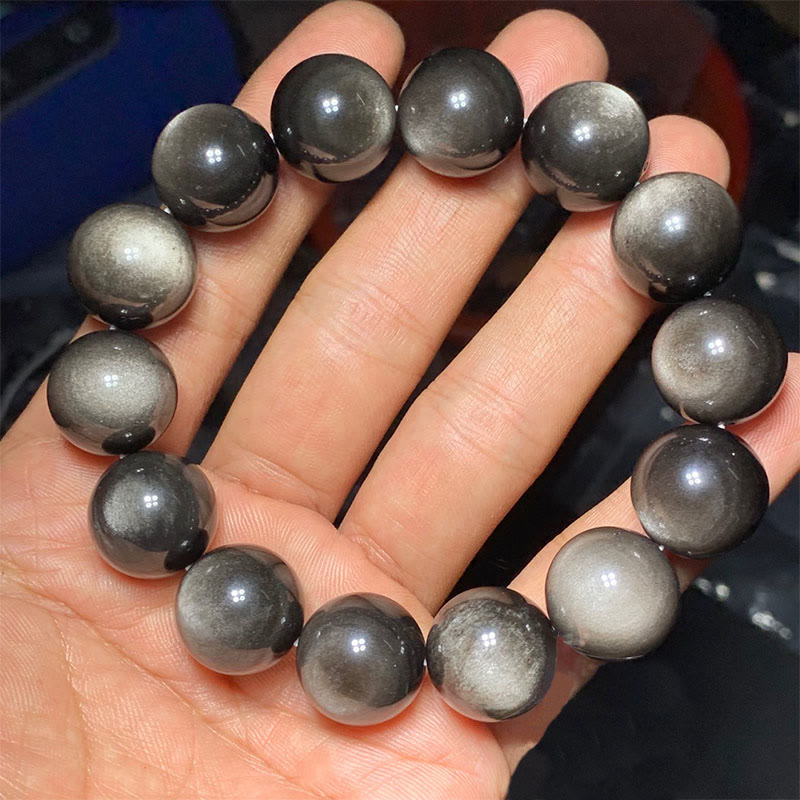 Braccialetto di protezione lenitiva in ossidiana lucida d'argento naturale Buddha Stones
