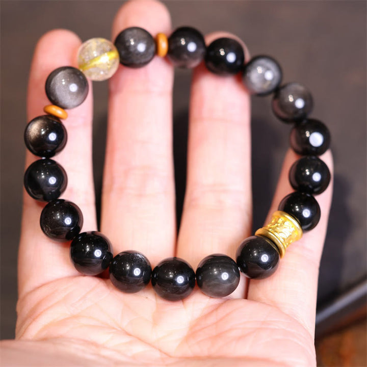 Braccialetto di protezione con perline di cristallo di ossidiana lucida in argento naturale Buddha Stones Om Mani Padme Hum