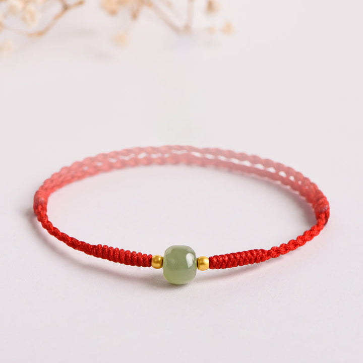 Bracciale intrecciato con Buddha Stones e portafortuna