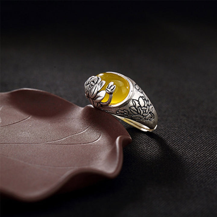 Anello regolabile con protezione e benedizione del loto in citrino Buddha Stones