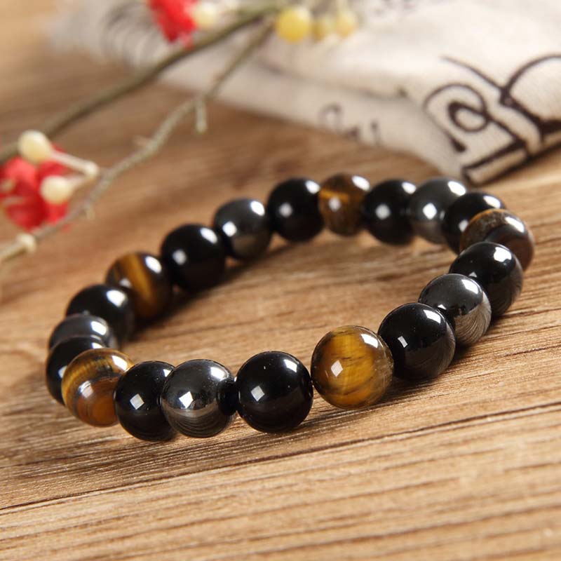 Set di bracciali e collane con occhio di tigre tibetano Buddha Stones