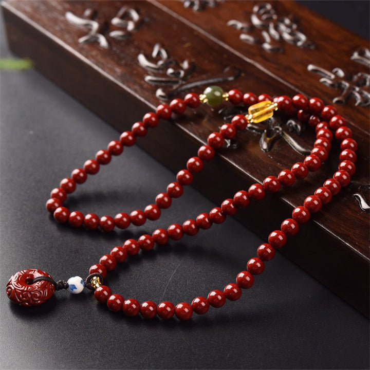 Braccialetto di benedizione a triplo giro con fibbia della pace in cinabro tibetano Buddha Stones Mala