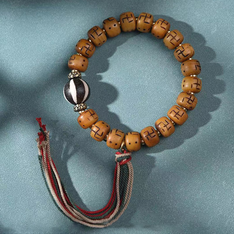 Buddha Stones naturale tibetano osso di cammello svastica Dzi perlina Shankha Buddha fascino Kirtimukha braccialetto con nappa protezione fortuna
