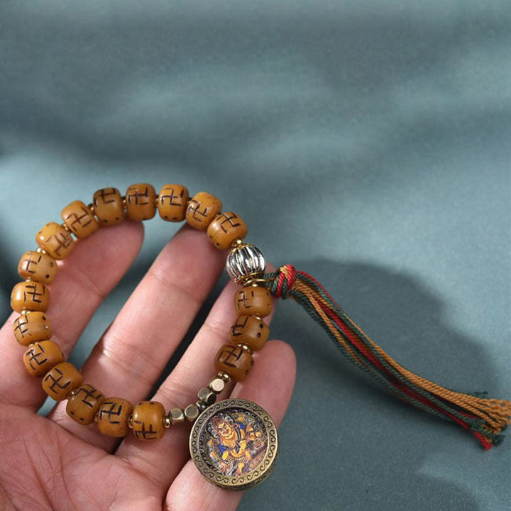 Buddha Stones naturale tibetano osso di cammello svastica Dzi perlina Shankha Buddha fascino Kirtimukha braccialetto con nappa protezione fortuna
