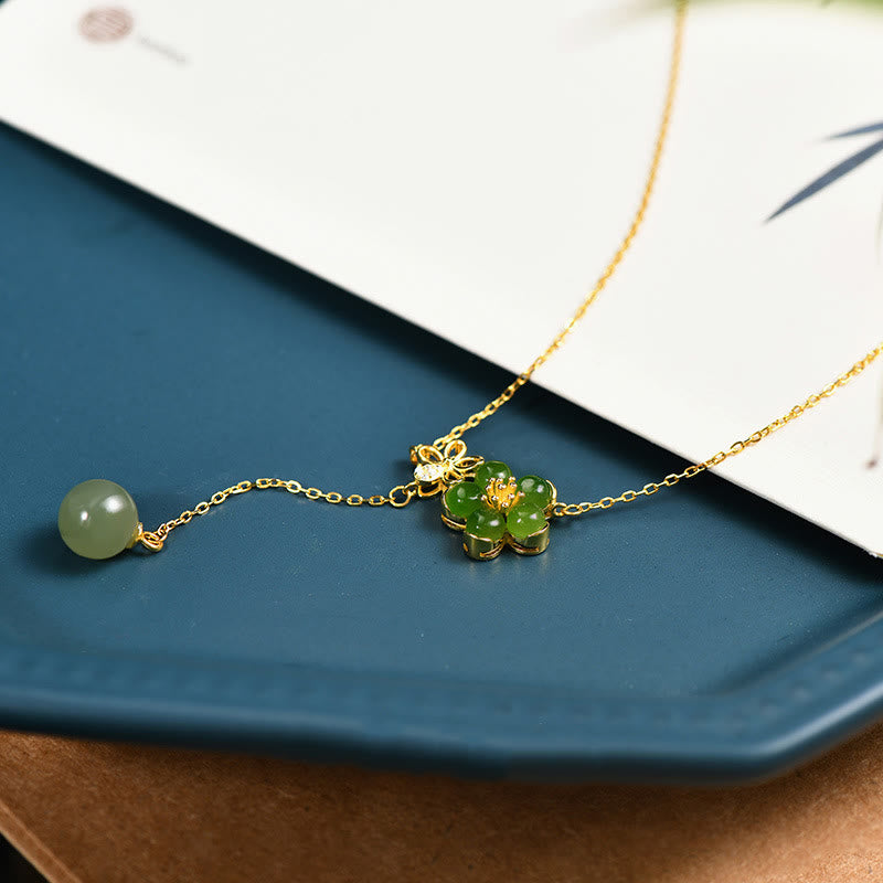 Collana con ciondolo portafortuna in argento sterling 925 con fiore di prugna in giada ciano Hetian, motivo Buddha Stones