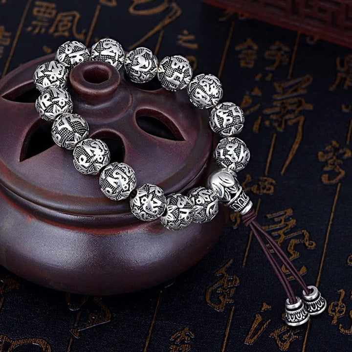 Braccialetto amuleto con perline in lega intagliata , Buddha Stones tibetane Om Mani Padme Hum