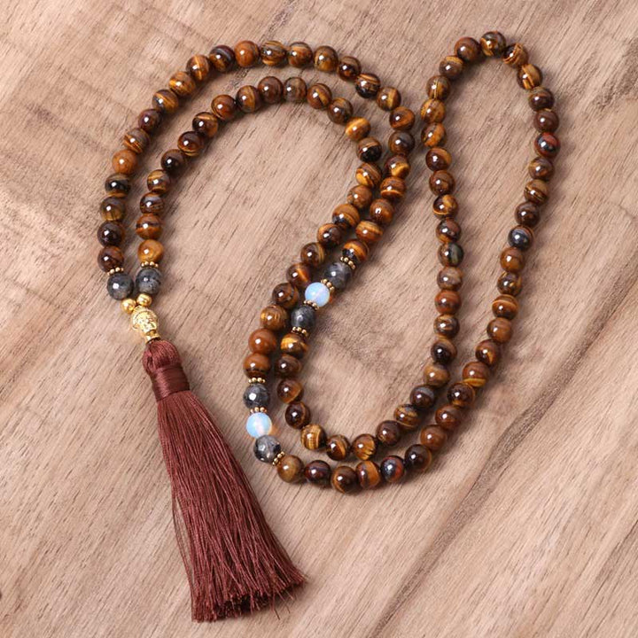 Collana con ciondolo a forma di nappa con Buddha Stones