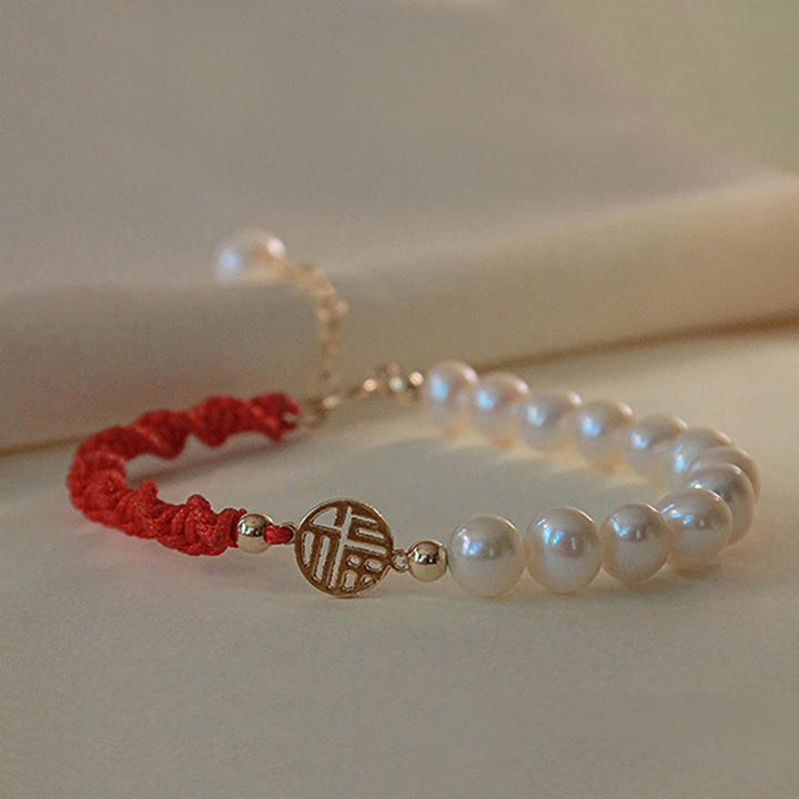 Braccialetto con treccia rossa e perle placcate in oro 14K e protezione dalla fortuna