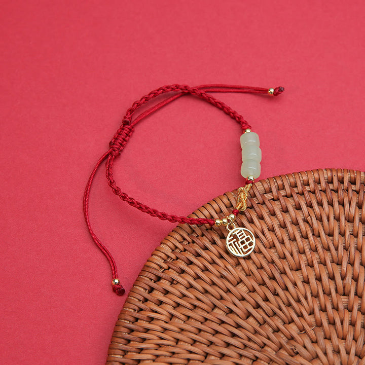Braccialetto con corda rossa con ciondolo a forma di carattere Fu, con perline di giada lavorate a mano Buddha Stones