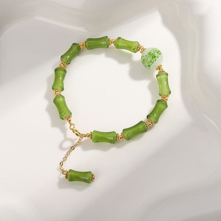 Bracciale a catena della ricchezza in agata muschiata con motivo in bambù verde Buddha Stones Liuli