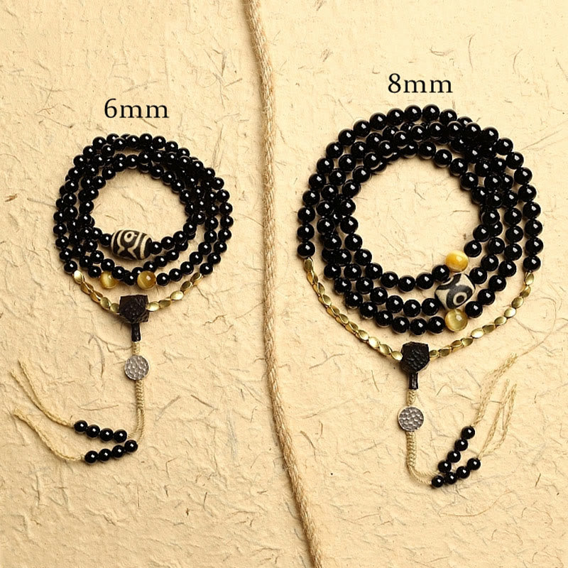 Buddha Stones Tibetano 108 Mala Beads Onice Nero Tre Occhi Dzi Beads Bracciale di Protezione