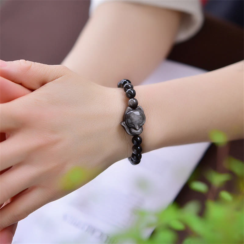 Braccialetto di protezione in ossidiana naturale con Buddha Stones argento lucido