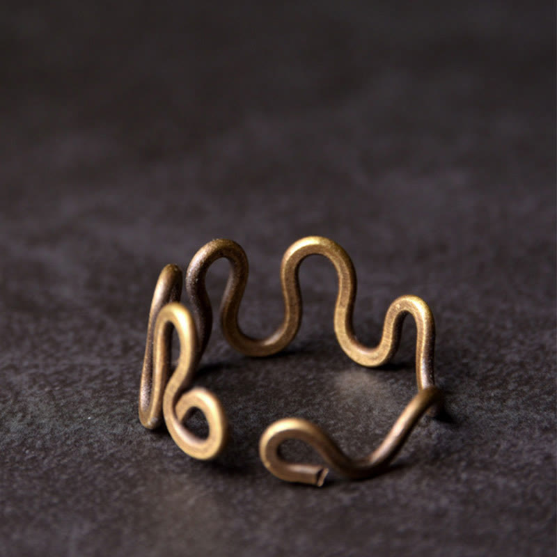 Anello regolabile in rame con design curvo in ottone semplice Buddha Stones, fortuna e ricchezza