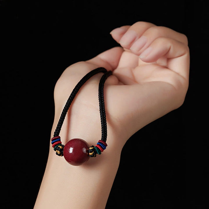 Collana con ciondolo in corda di benedizione con perline di cinabro e Buddha Stones