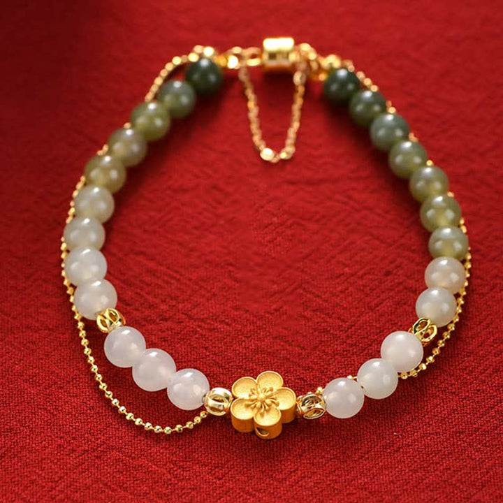 Bracciale Buddha Stones in argento sterling 925 con giada naturale Hetian e fiori di pesco