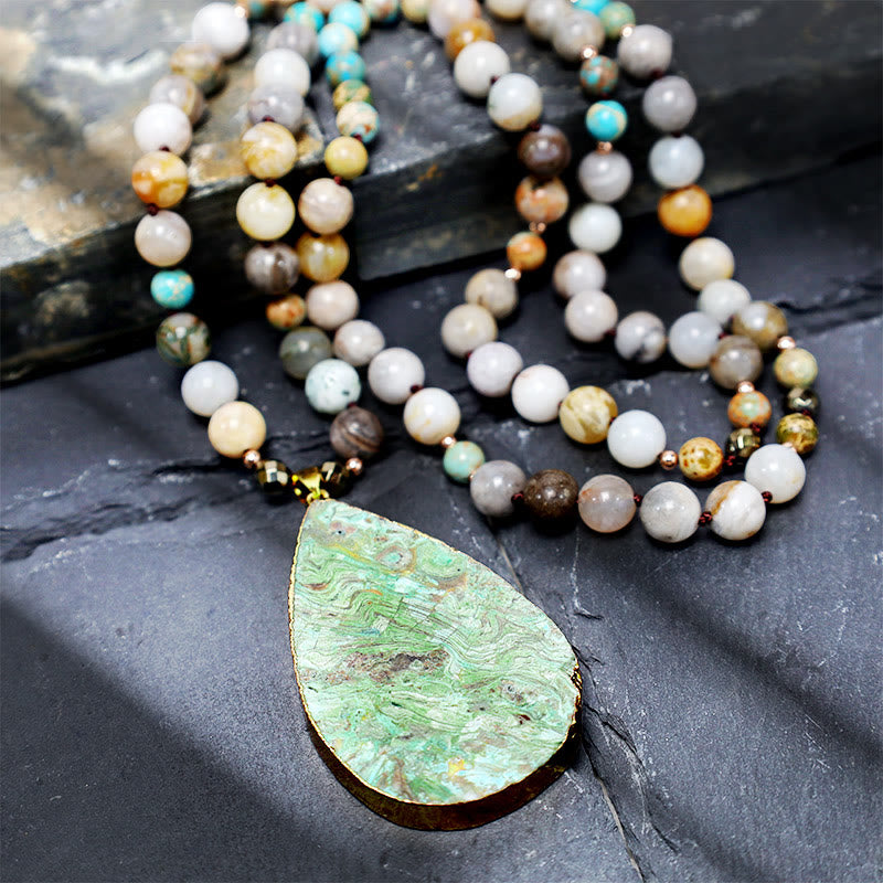 Collana di perline di guarigione in diaspro Picasso naturale dell'oceano Buddha Stones