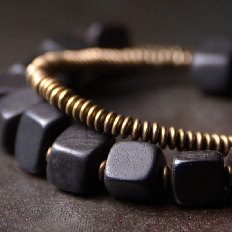 Braccialetto doppio giro in legno di ebano tibetano di Buddha Stones e rame