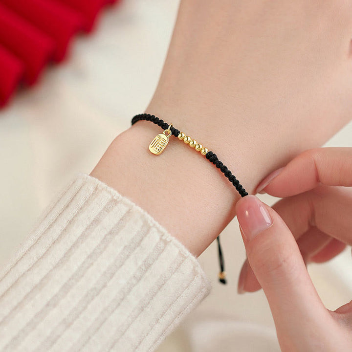 Braccialetto di corda con ciondolo a forma di carattere Fu fatto a mano con Buddha Stones