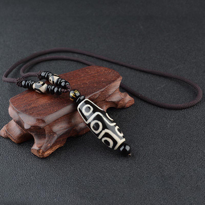 Collana di protezione della ricchezza con perline Dzi a nove occhi Buddha Stones - image 1