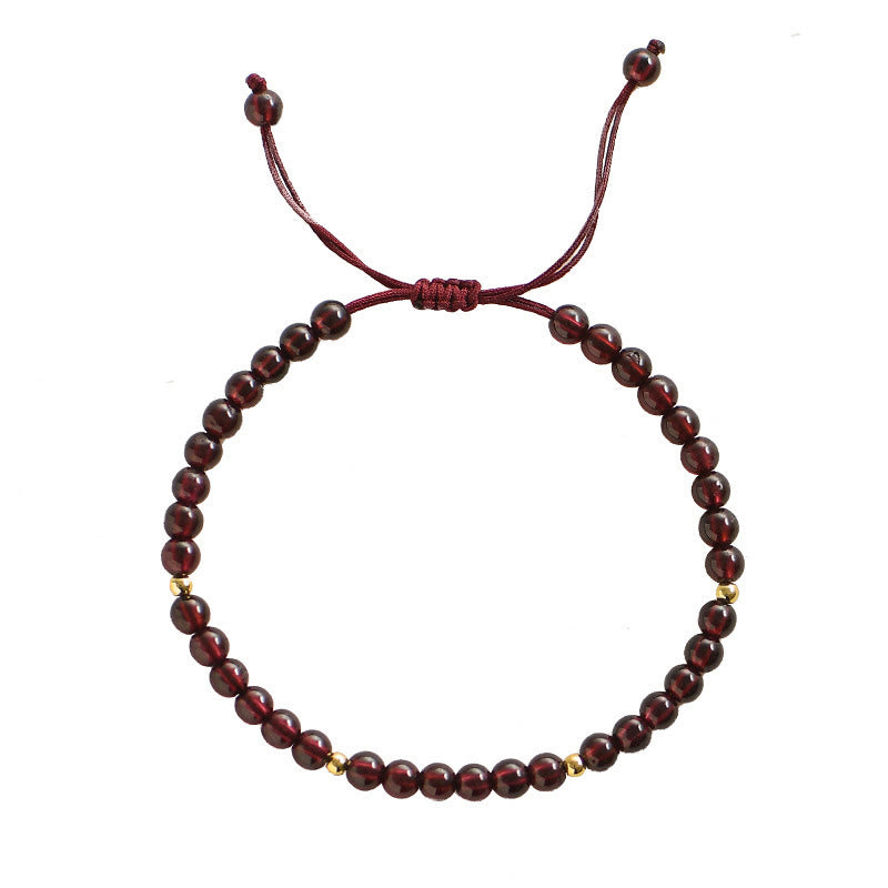 Braccialetto di stabilità con perline dorate e granato naturale Buddha Stones