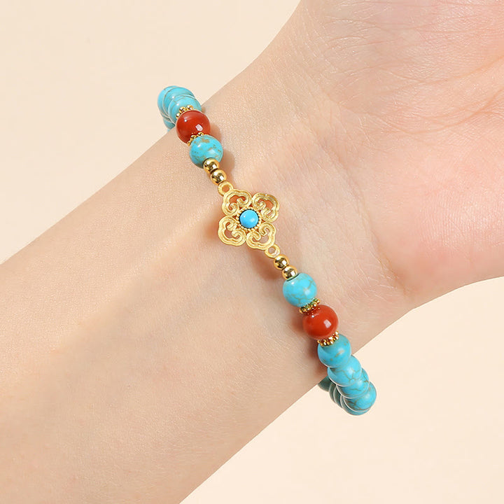 Braccialetto di protezione dell'equilibrio con perline turchesi Buddha Stones