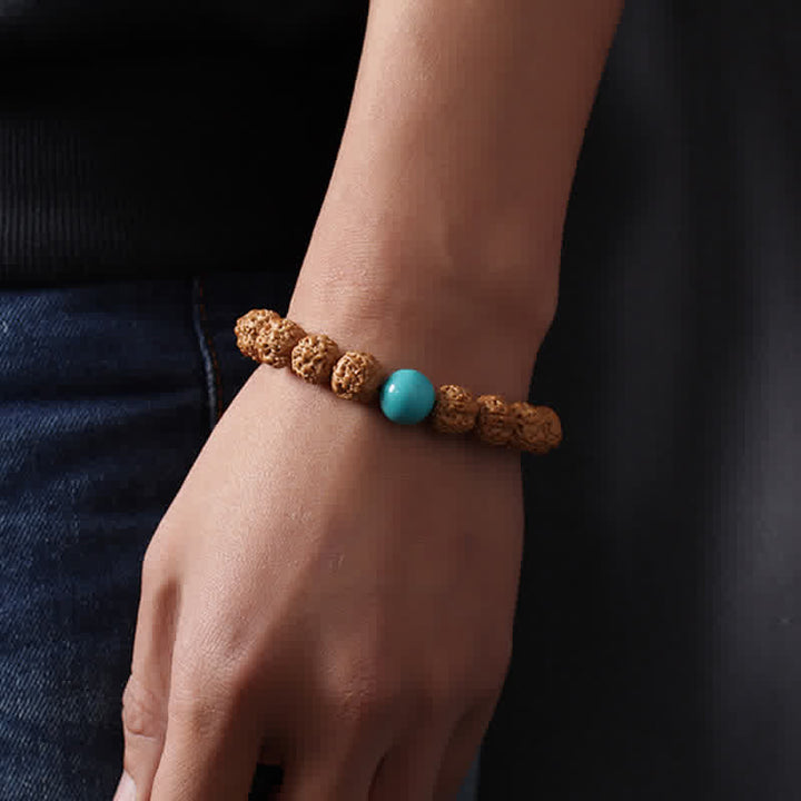 Buddha Stones Tibet Rudraksha Bodhi Seed Dzi Bead Ambra Turchese Bracciale della Ricchezza