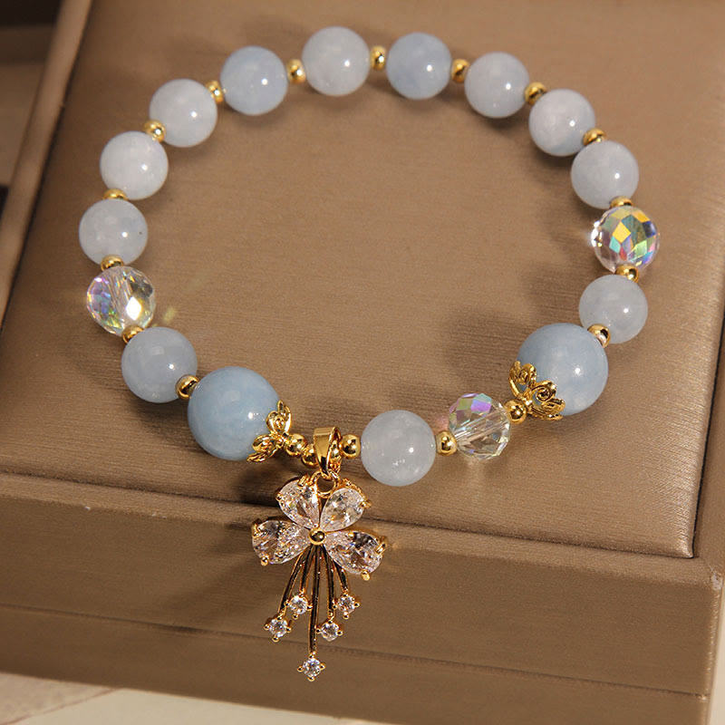 Braccialetto con ciondolo a farfalla in zircone con cristalli rosa e acquamarina Buddha Stones