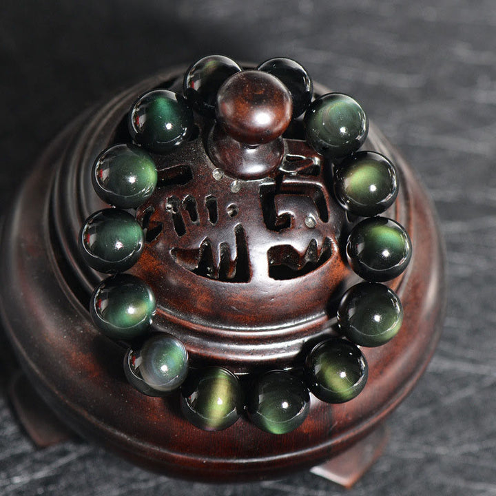 Braccialetto della ricchezza in ossidiana verde naturale Buddha Stones