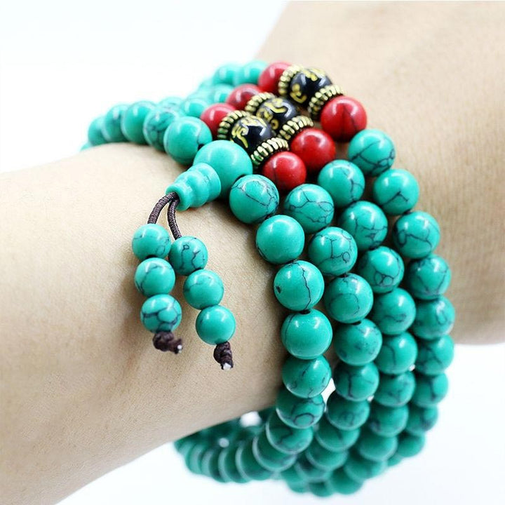 Collana di purificazione Mala in turchese tibetano Buddha Stones