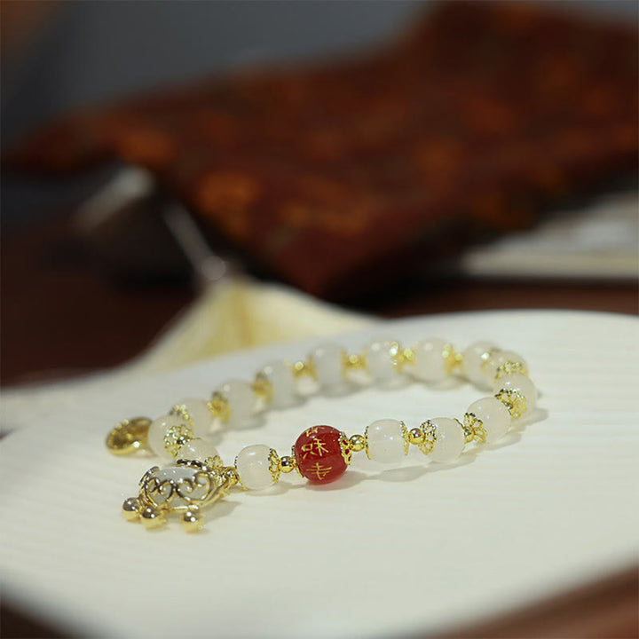Braccialetto di benedizione con ciondolo a forma di lucchetto cinese con mulino a vento Buddha Stones Fu Character