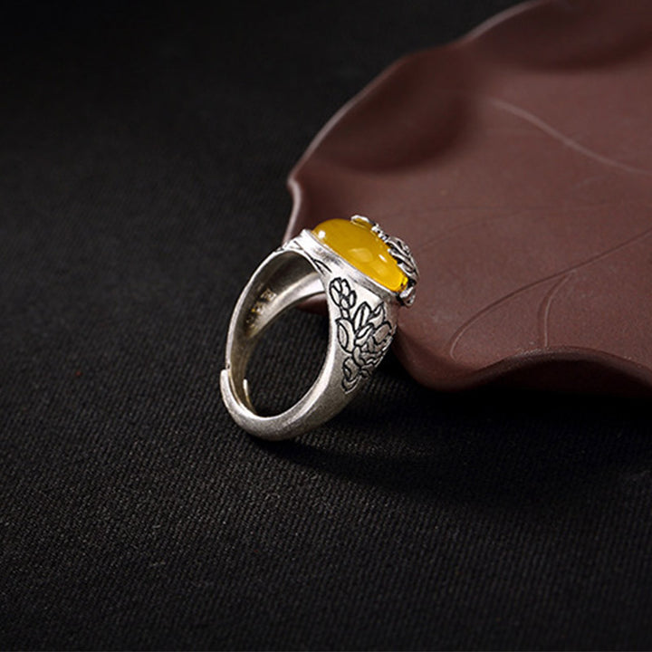 Anello regolabile con protezione e benedizione del loto in citrino Buddha Stones