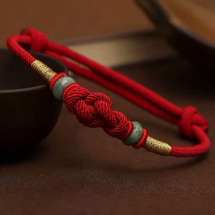 Porta buona fortuna braccialetto di coppia intrecciato con nodo di giada rossa
