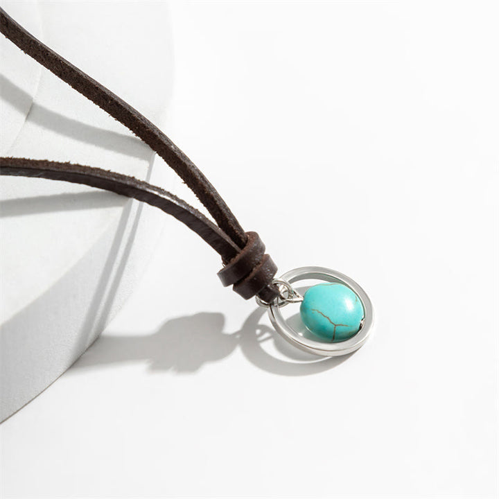Collana con ciondolo in pietra turchese rotonda con pietre Buddha Stones e forza di protezione
