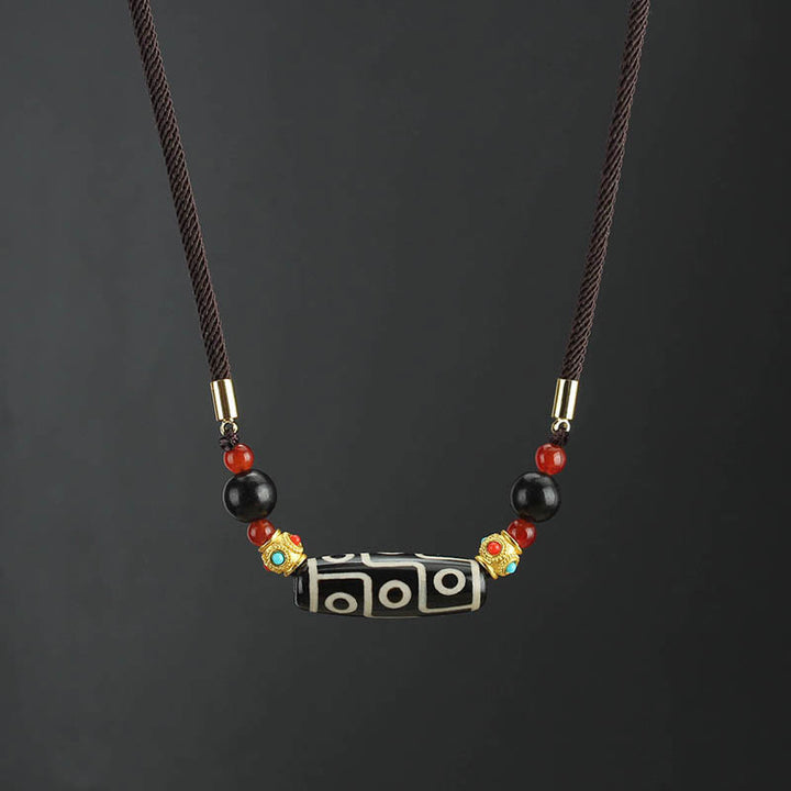 Buddha Stones Tibetano Nove Occhi Dzi Bead Protezione Benedizioni Collana Pendente - Perlina Dzi a nove occhi bianca e nera - image 0