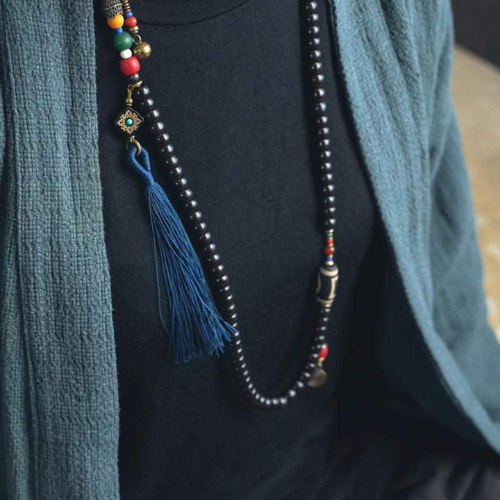 Buddha Stones 108 Perline Mala Legno di Ebano Dzi Perline Rame Braccialetto con Nappa