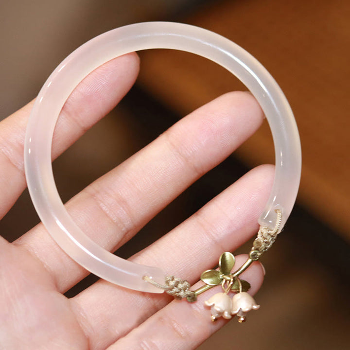 Braccialetto con fiore di mughetto, felicità e forza