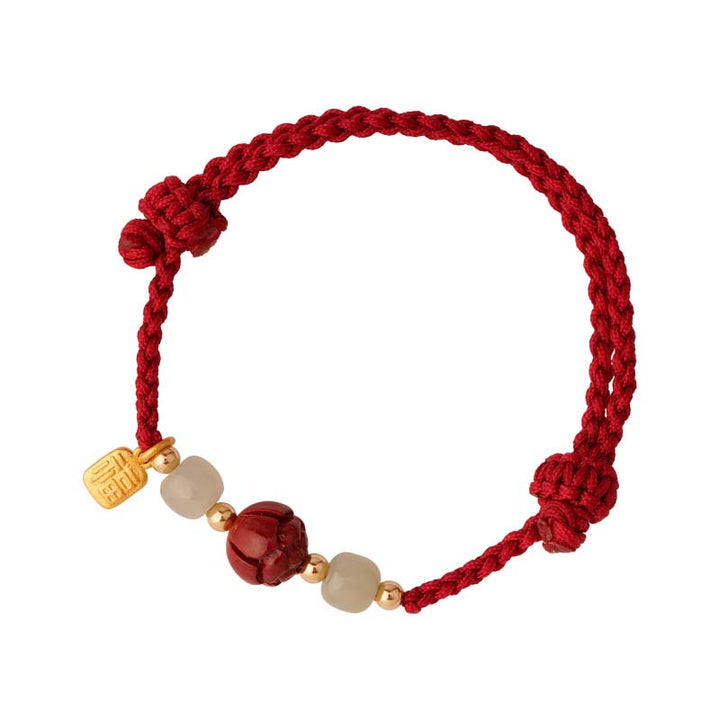 Braccialetto intrecciato con corda rossa calma, giada, cinabro e loto Buddha Stones