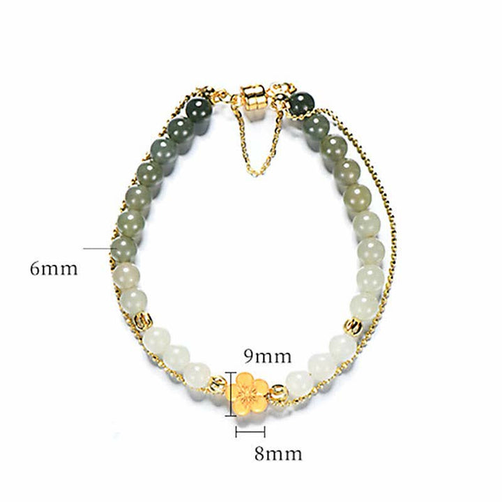 Bracciale Buddha Stones in argento sterling 925 con giada naturale Hetian e fiori di pesco