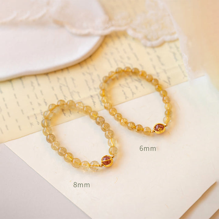Braccialetto di protezione a forma di stella in quarzo rutilato dorato Buddha Stones Strawberry Quartz