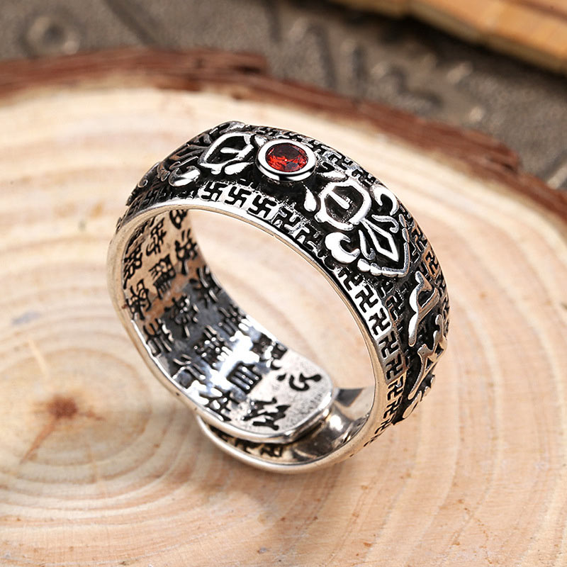 Anello di ricchezza in rame e rubino tibetano