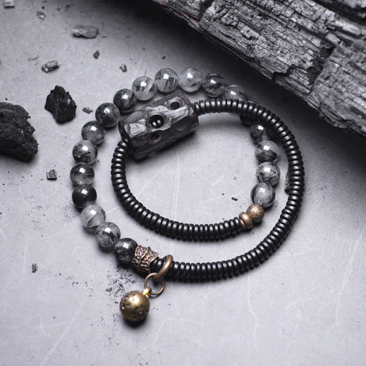 Braccialetto di coppia della saggezza del rame del legno di ebano del quarzo rutilato nero Buddha Stones
