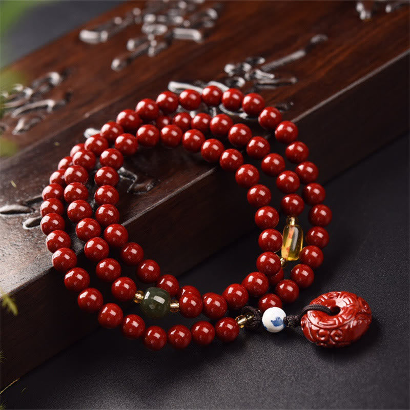 Braccialetto di benedizione a triplo giro con fibbia della pace in cinabro tibetano Buddha Stones Mala