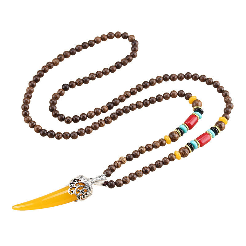 Collana con ciondolo in stile corno in pietra turchese e legno wenge, protezione e meditazione