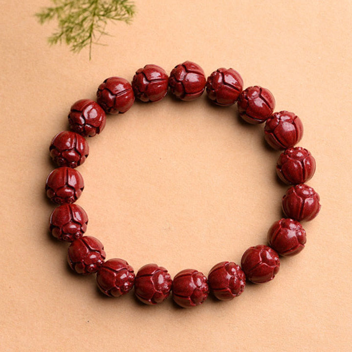 Braccialetto di benedizione del loto con motivo a fregi in cinabro naturale Om Mani Padme Hum Buddha Stones