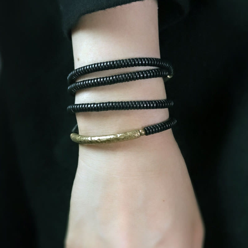 Bracciale multistrato in legno di ebano e rame Buddha Stones Balance