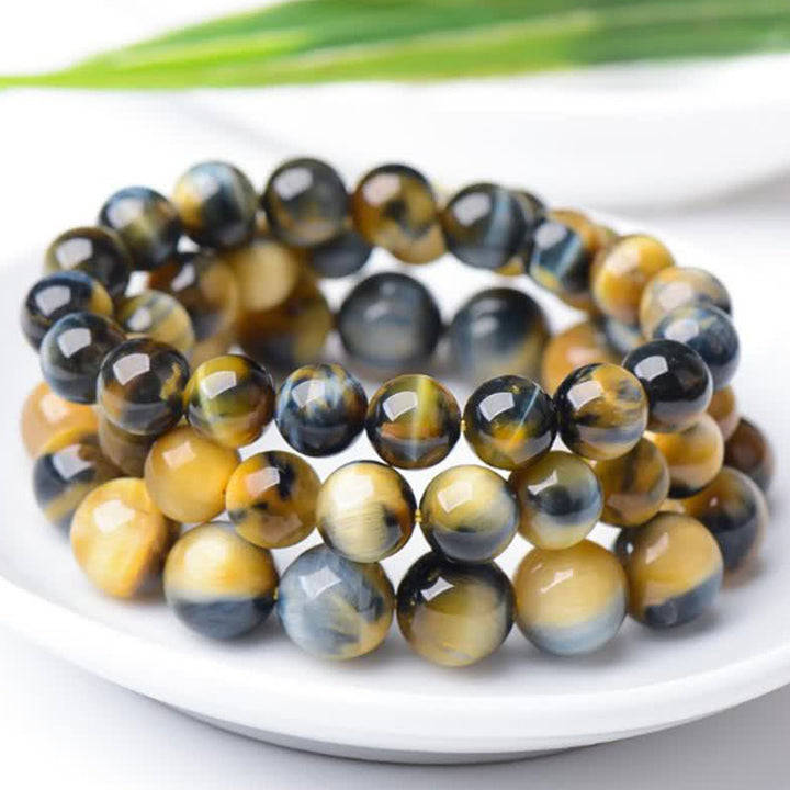 Braccialetto di protezione e forza con occhio di tigre Buddha Stones