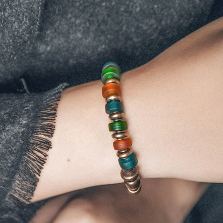 Braccialetto di ricchezza in rame con perline di vetro colorate tibetane