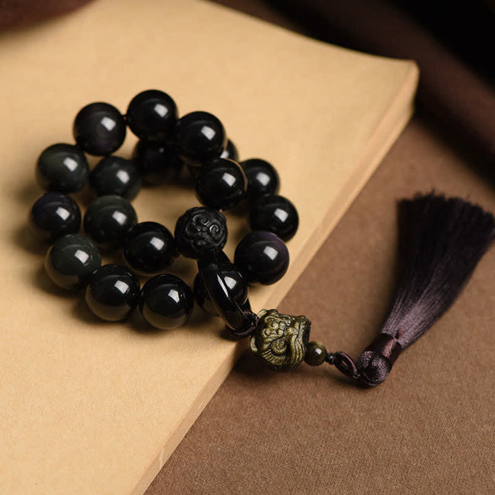 Buddha Stones Ossidiana nera naturale Leone Mala da polso Protezione Nappe Mala tascabile Decorazione per auto