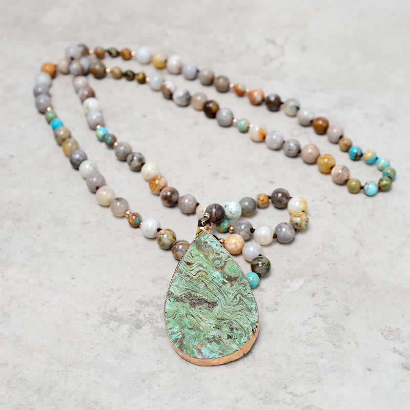 Collana di perline di guarigione in diaspro Picasso naturale dell'oceano Buddha Stones